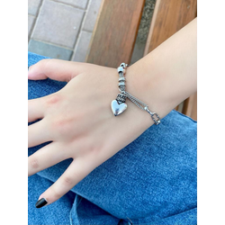The silver heart bracelet